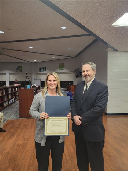 Photo of the January staff member of the month for Central Elementary Jeanette Castner with the principal.